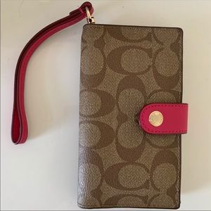 Coach, Phone Wallet. It fits a Regular size Phone!